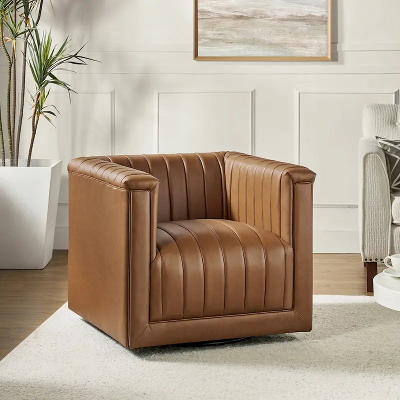Fauteuil pivotant Esteban en cuir moderne de type "Barrel Chair" par HULALA HOME