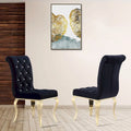 Chaises de salle à manger capitonnées à boutons noirs avec pieds dorés